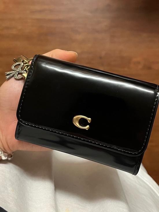 Coach Handbags - Coach Spazzolato Leather Black Wallet with gold charm